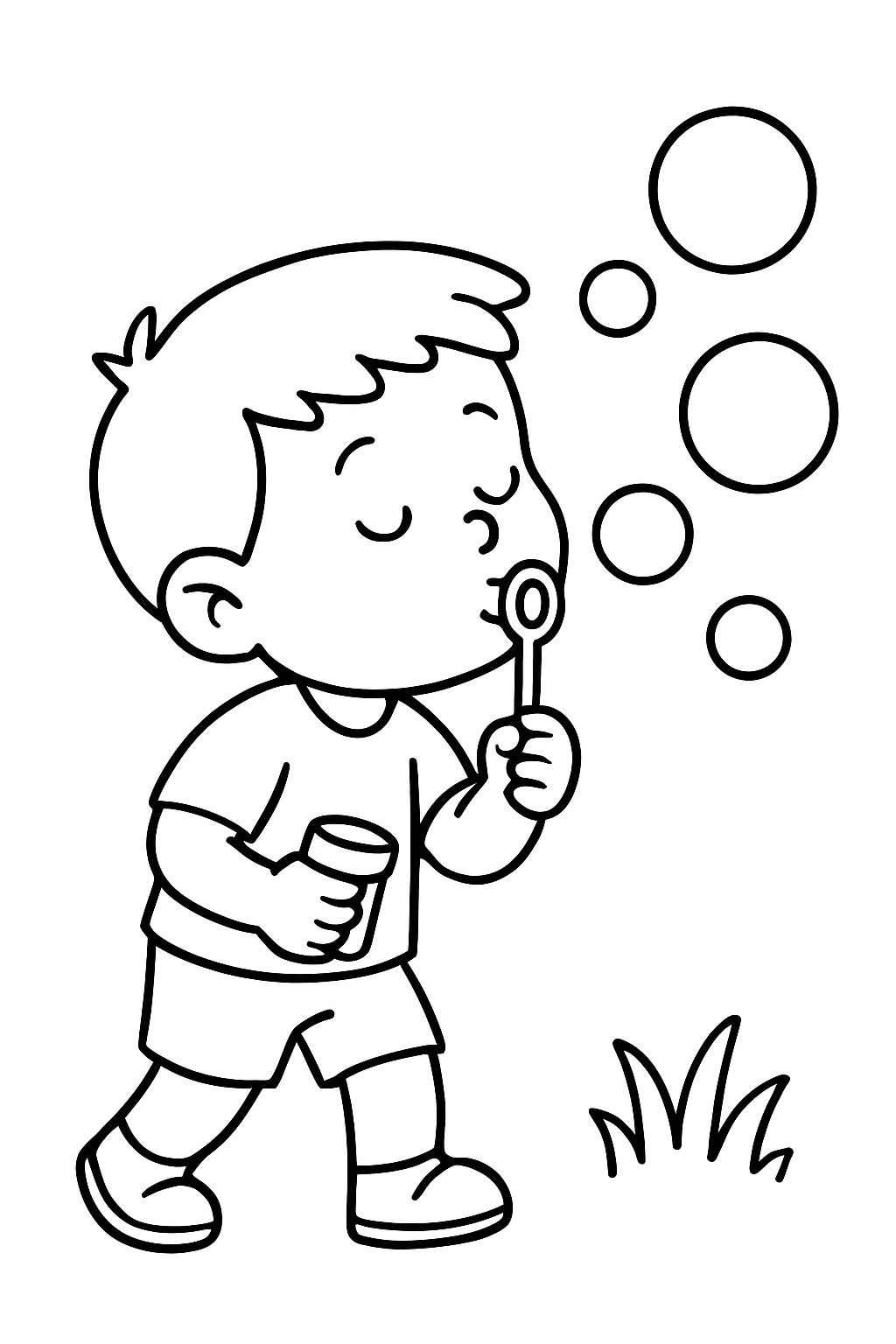 toddler boy blowing bubbles