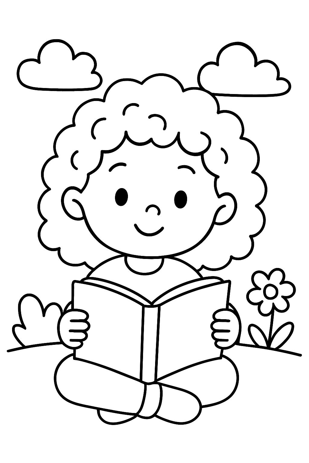 A curly girl reading a book